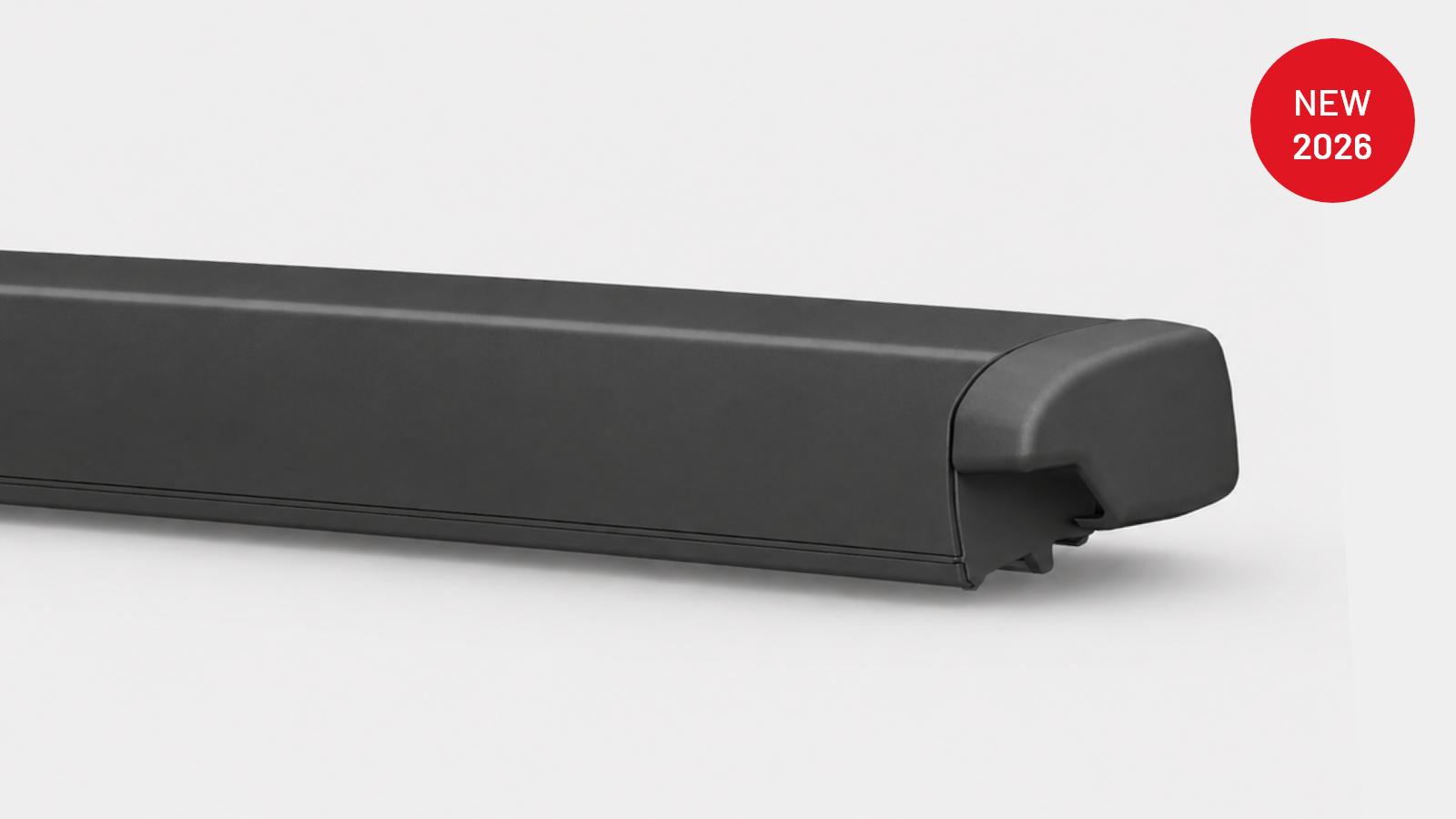 NQ606 motorized legless RV awning with matte dark gray aluminium cassette, closed